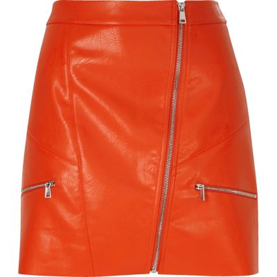 Red leather look zip mini skirt
